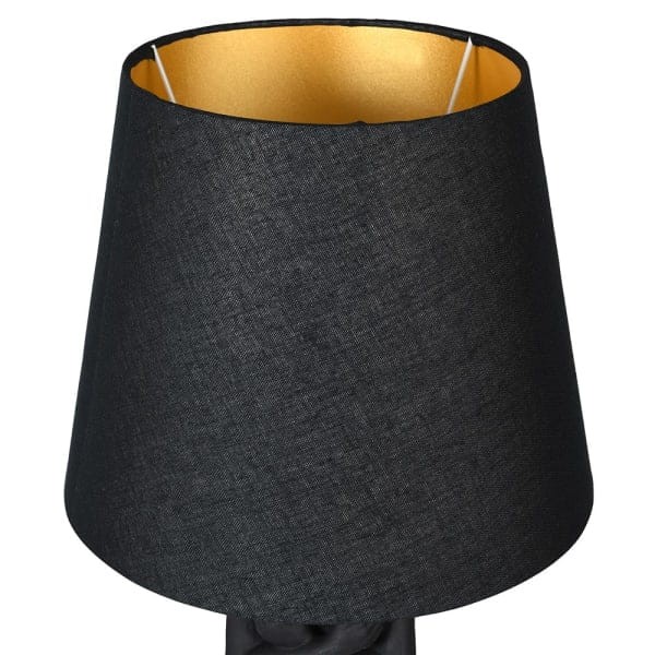 Designerska czarna lampa z rzeźbiarską podstawą kobiecej sylwetki