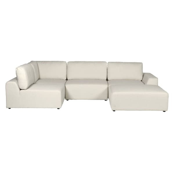 Biała sofa modułowa Cloud Bouclé w eleganckim salonie