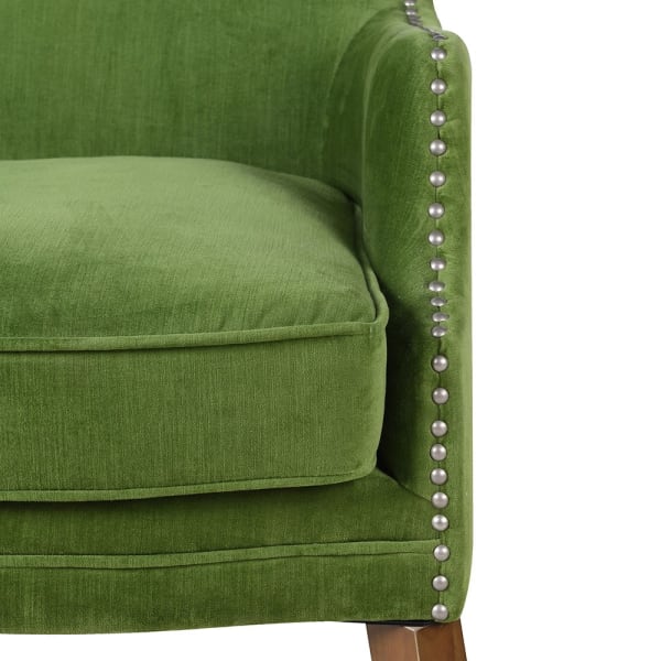 Mała sofa do salonu w kolorze pistacjowym
