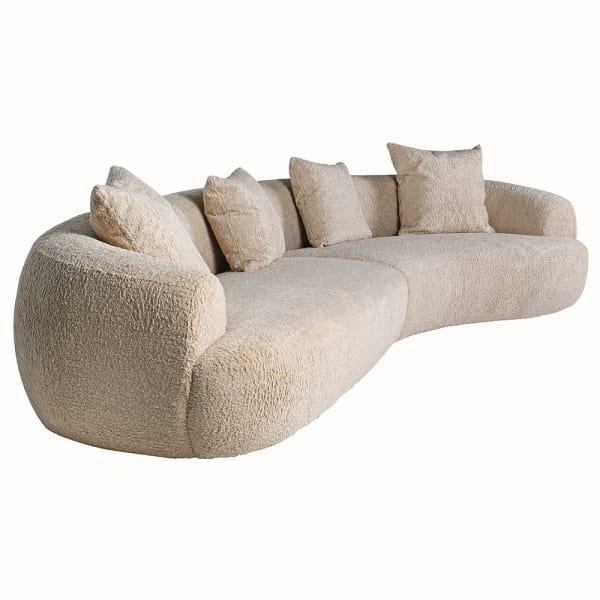 Duża sofa Ava Bouclé z zaokrąglonymi bokami – widok pod kątem