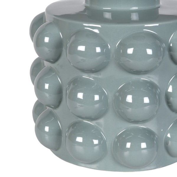 Detal szkliwionej ceramicznej podstawy lampy Kew z wypukłym reliefem
